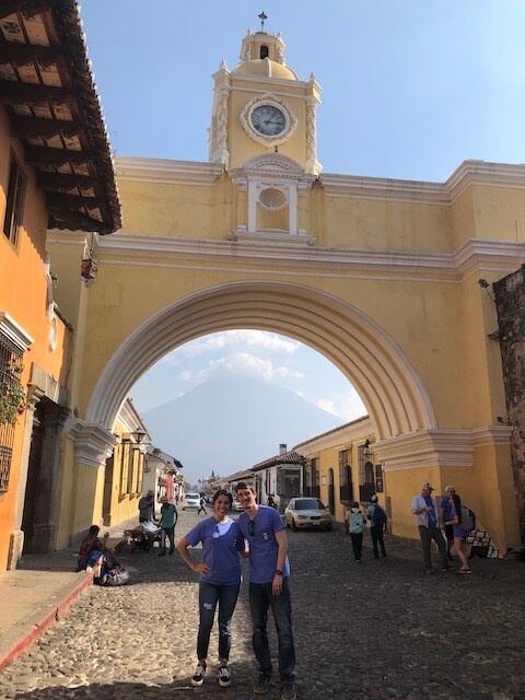 Dr. Patrick in Guatemala by a yellow arch