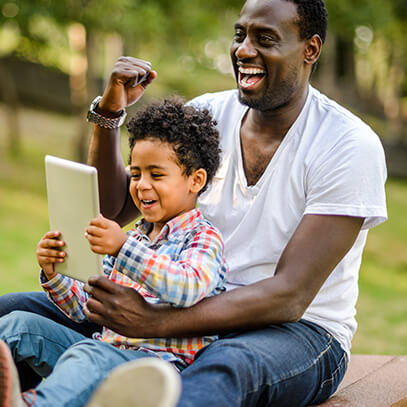 Father and son reading