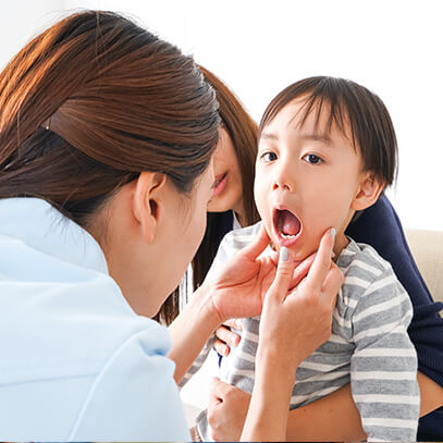 Little boy getting dental exam