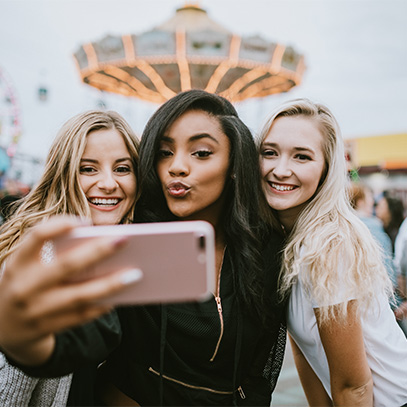 group of teen girls at a fair