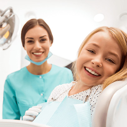 girl at the pediatric dentist