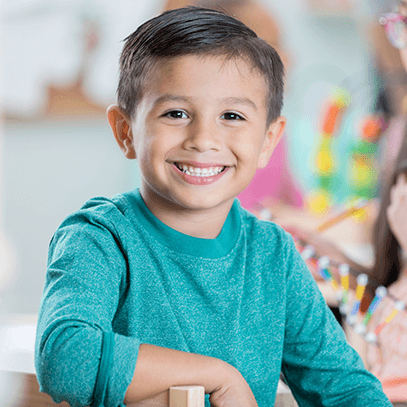 boy smiling at the camera