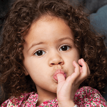 little girl with curly hair