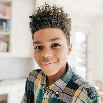 boy smiling at the camera