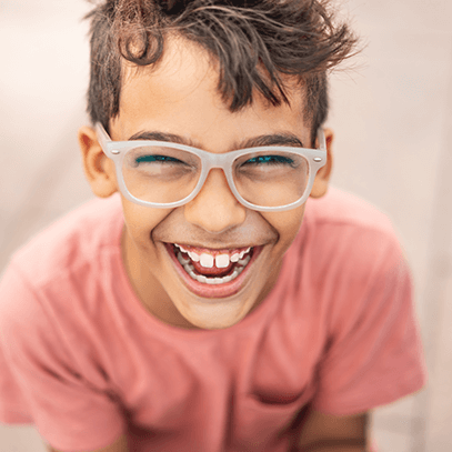 boy smiling at the camera