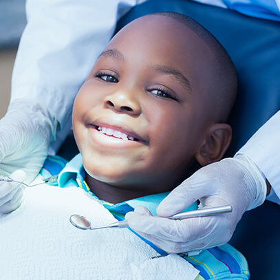 boy smiling at the camera